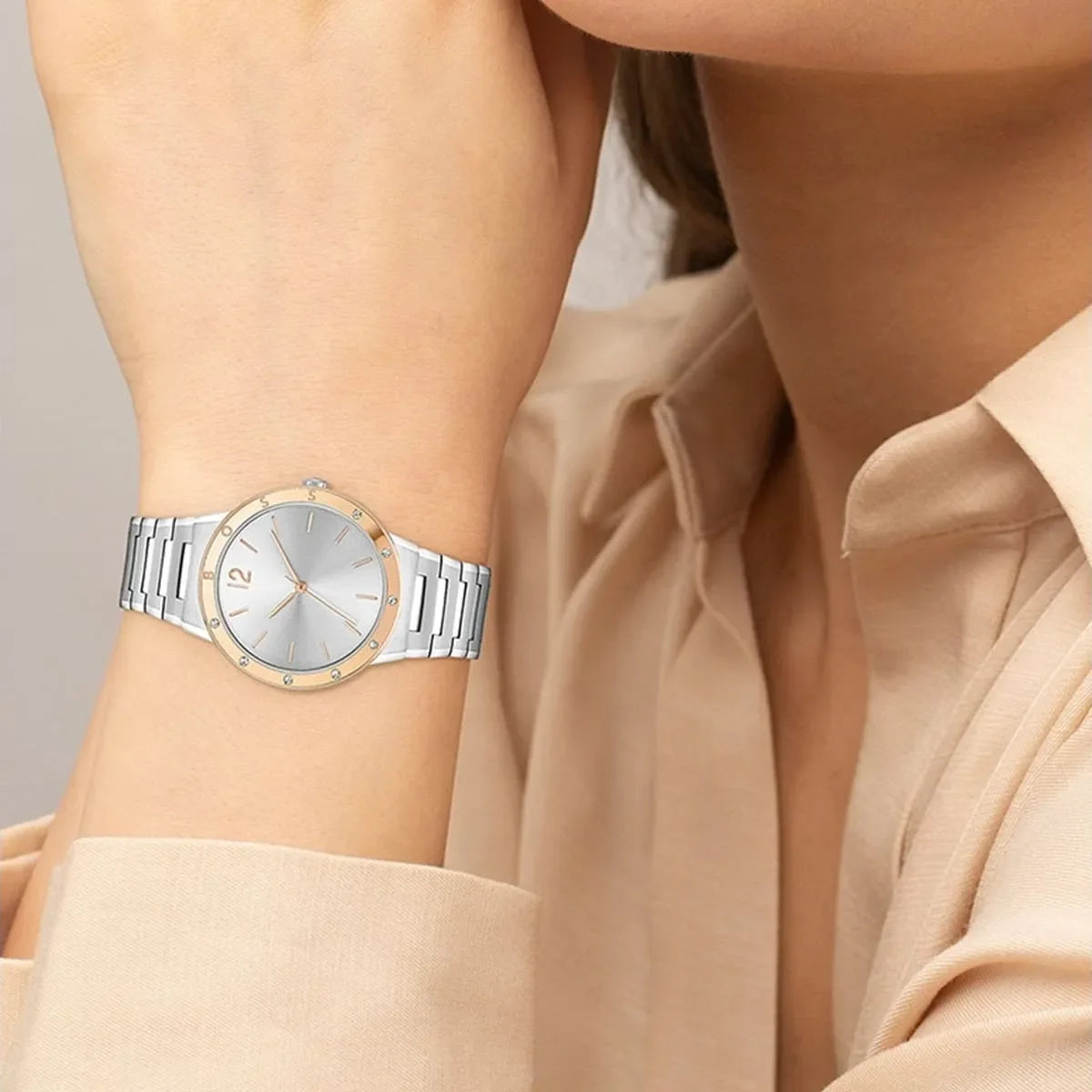 Hugo Boss Breath women's watch on wrist showing silver dial and rose gold bezel