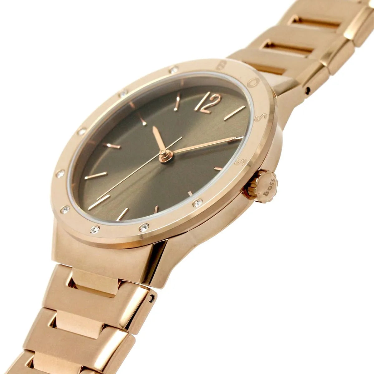 Close-up of Hugo Boss Breath rose gold watch dial with crystal bezel and hands