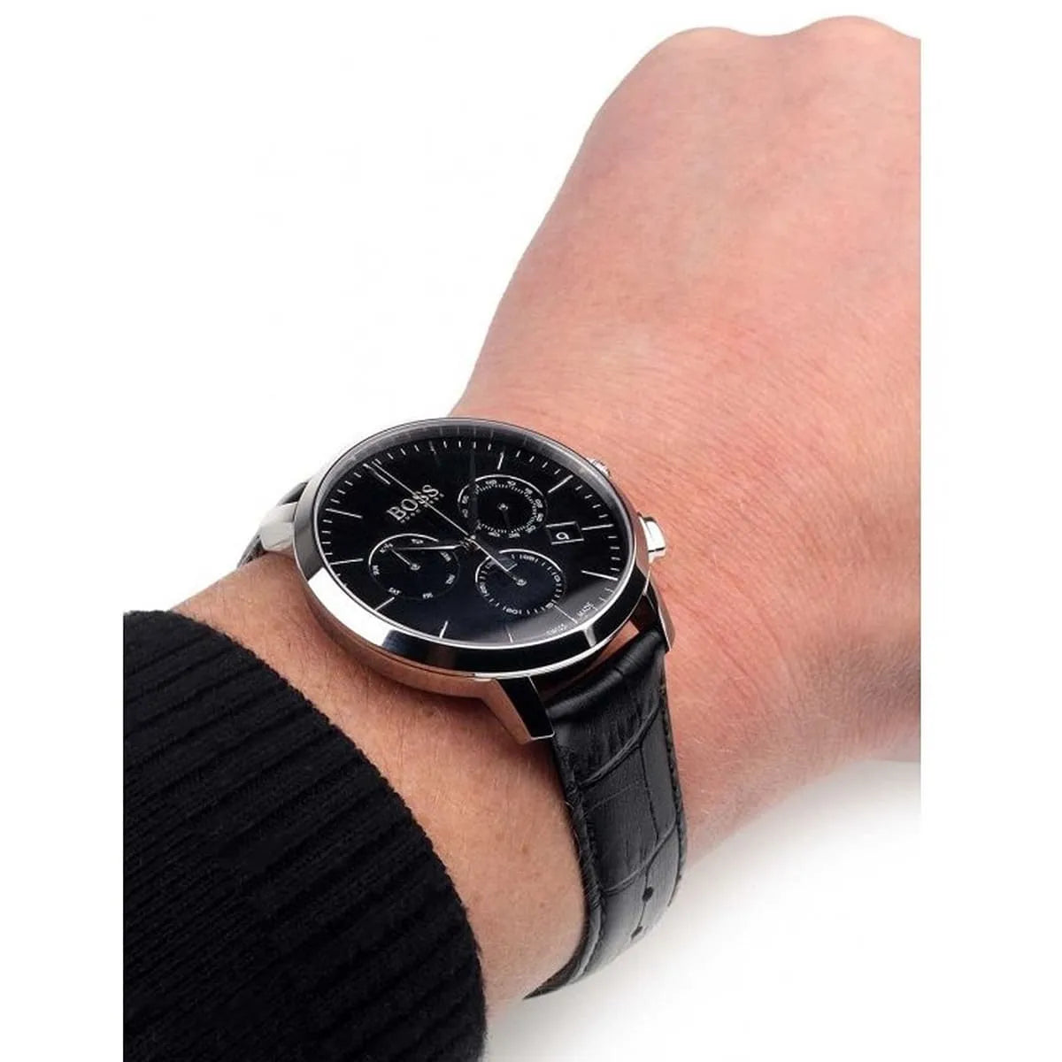 Hugo Boss 1513266 chronograph watch on wrist showing black dial with subdials and black leather strap