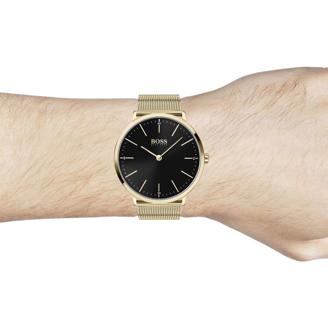 Hugo Boss Horizon watch worn on wrist with black dial and gold mesh bracelet