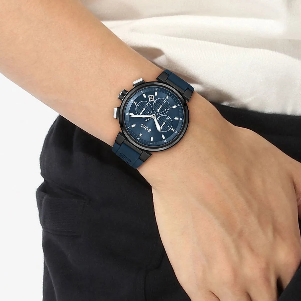 Hugo Boss P-Lux chronograph watch worn on wrist with blue rubber strap