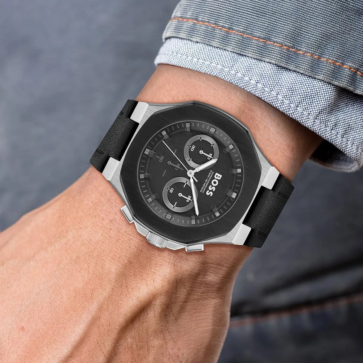 Hugo Boss Skymaster chronograph worn on wrist with blue shirt sleeve