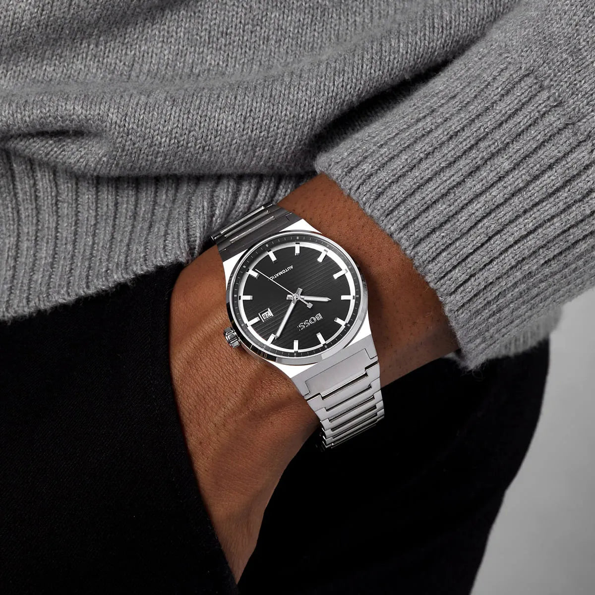 Hugo Boss Candor Auto worn on wrist with black dial and steel bracelet