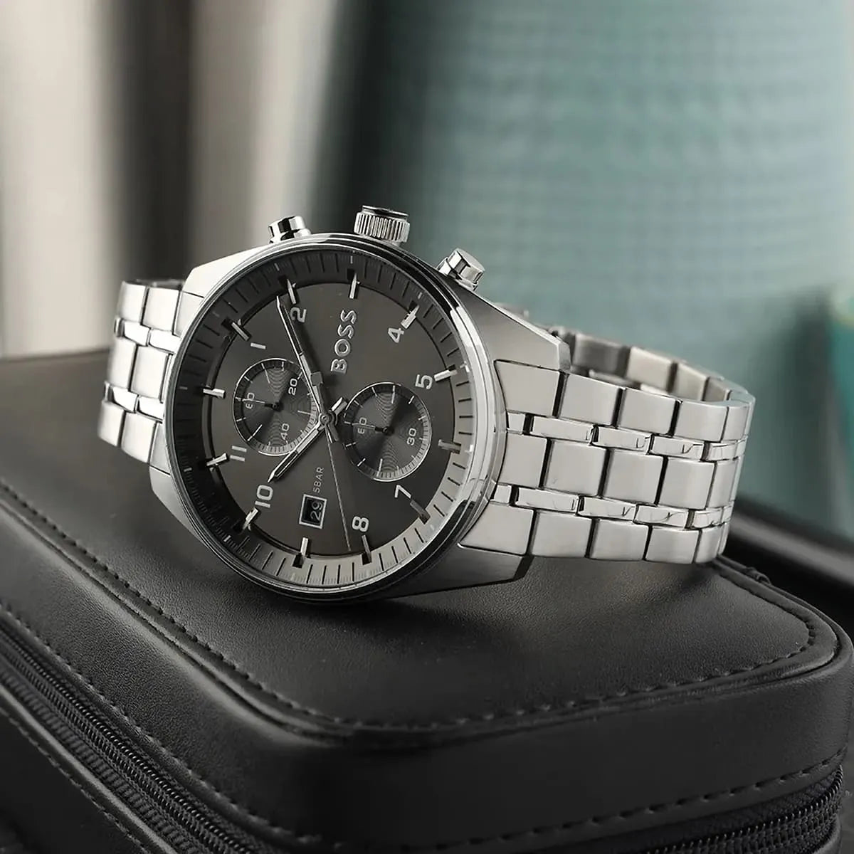 Hugo Boss Skytraveller chronograph watch side view with three-link stainless steel bracelet