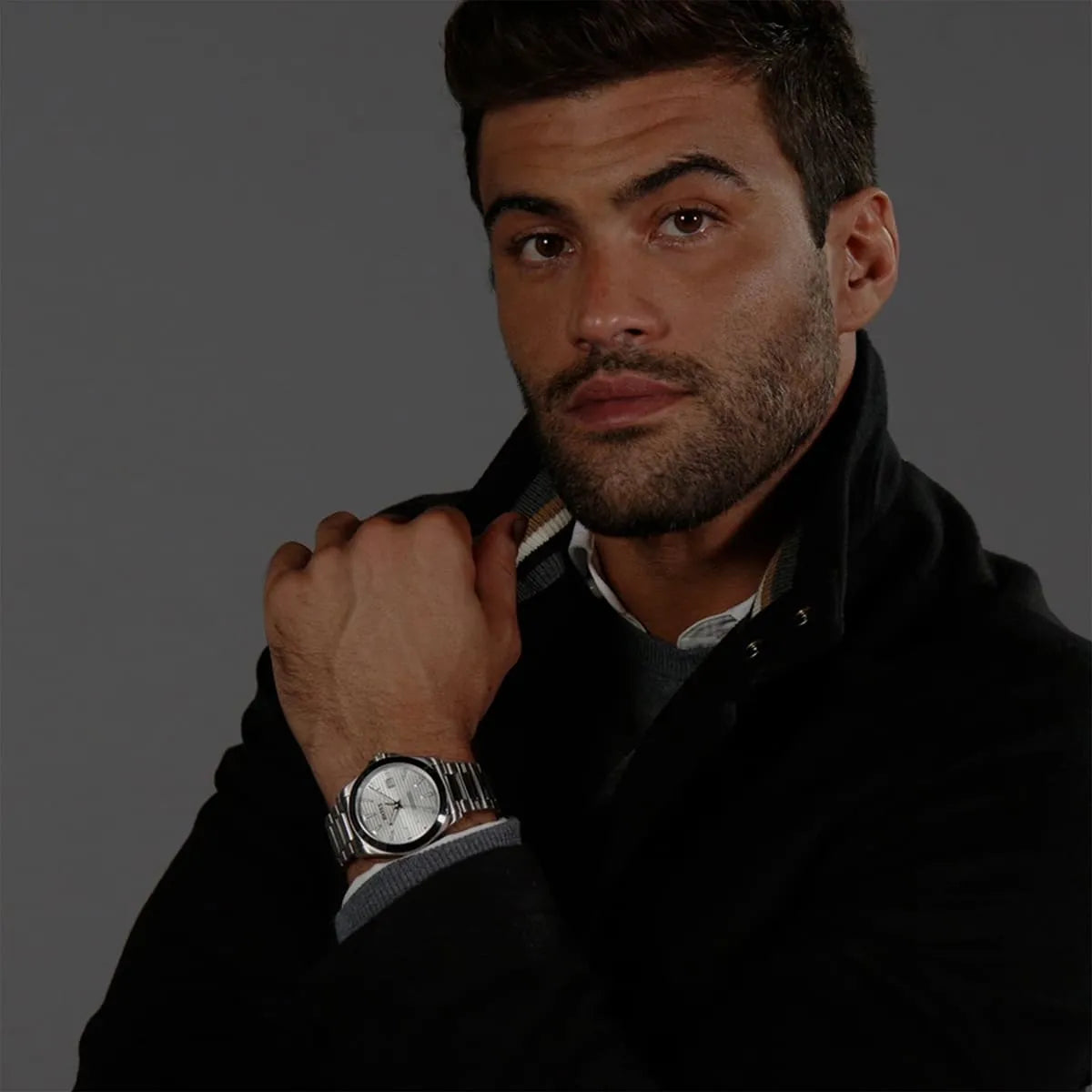 Hugo Boss Skymaster watch worn on wrist, lifestyle shot of man wearing black jacket