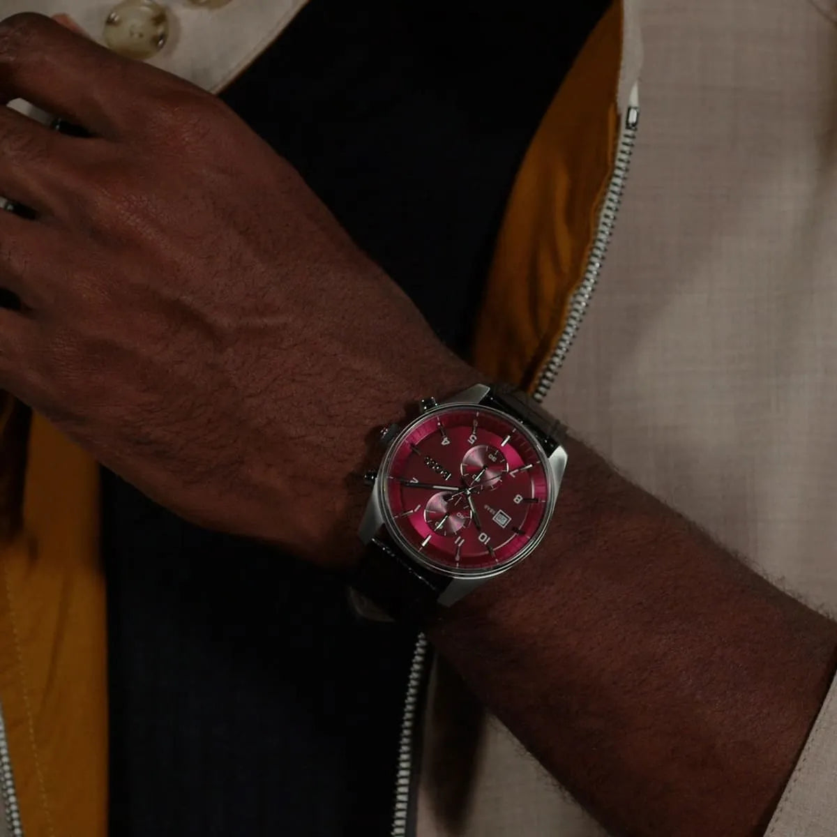 Hugo Boss Skymaster watch worn on wrist showing burgundy dial and chronograph design