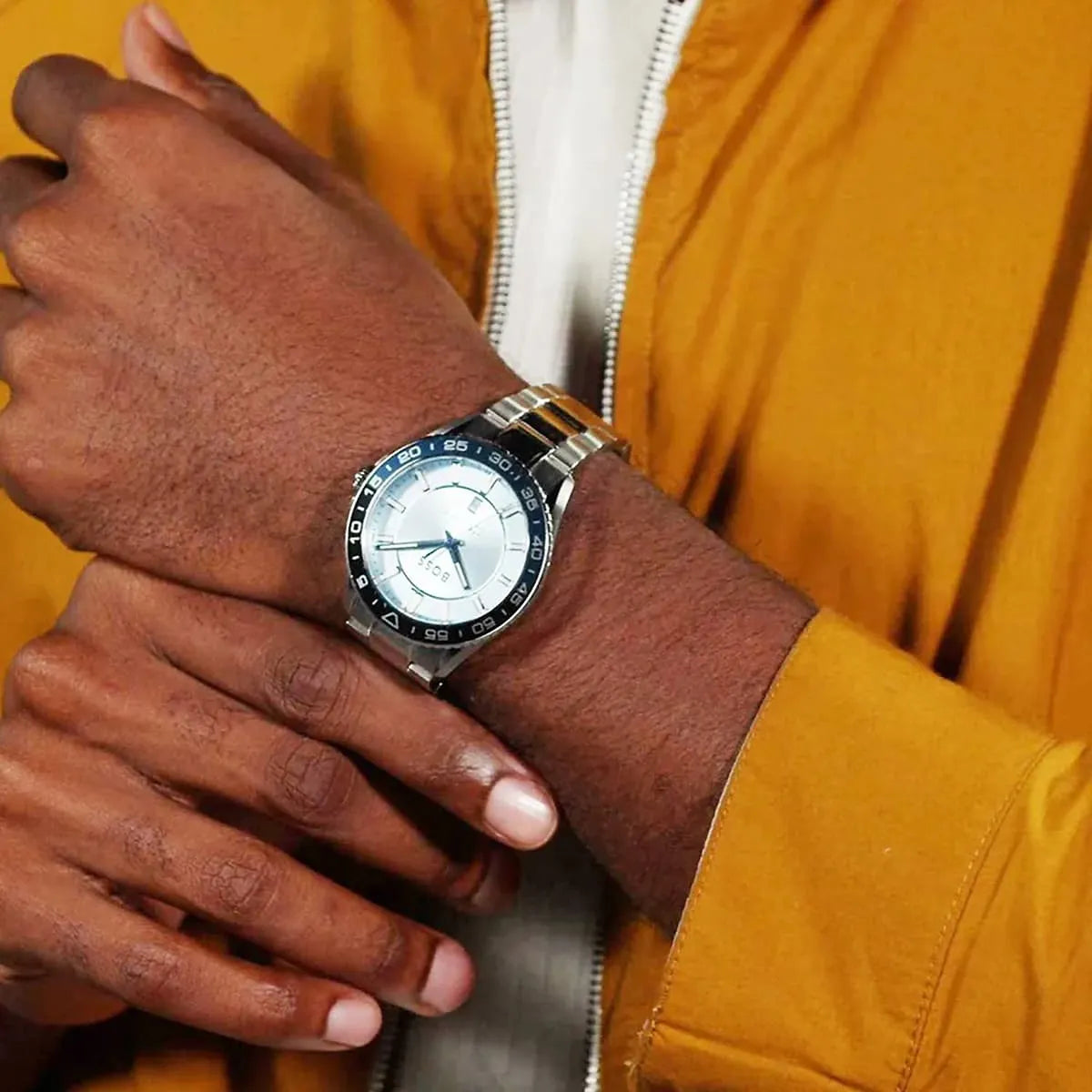 Hugo Boss Runner watch worn on wrist with light blue dial and black bezel