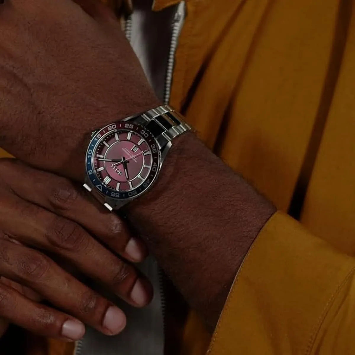 Hugo Boss Runner watch worn on wrist with burgundy dial visible