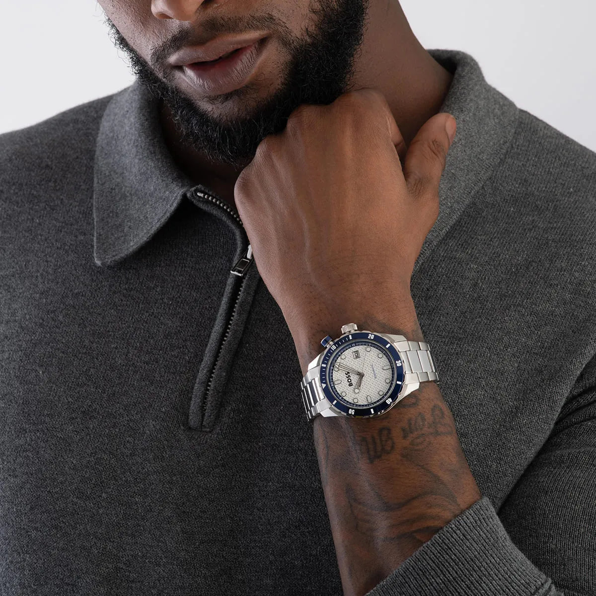 Hugo Boss Skymaster Quartz watch worn on wrist with grey sweater