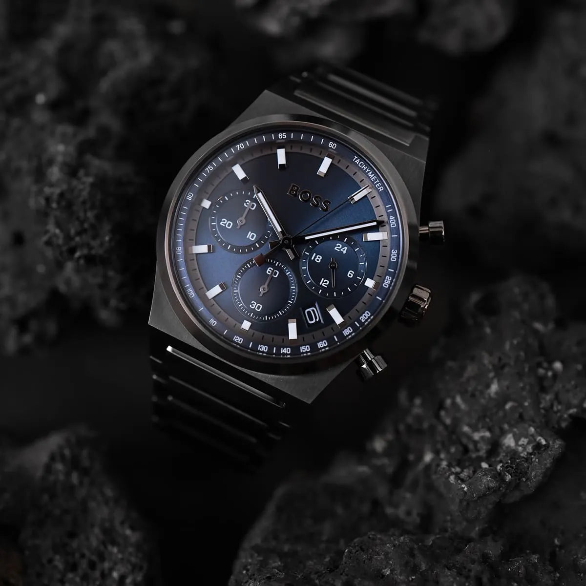 Hugo Boss Candor Chrono chronograph watch styled on textured black surface