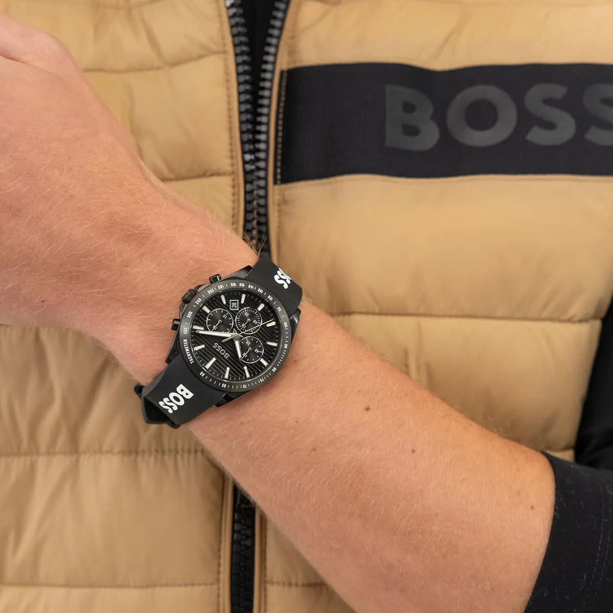 Hugo Boss Strike chronograph watch worn on wrist with black rubber strap