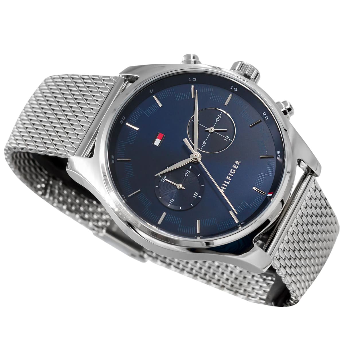 Tommy Hilfiger men's watch at angle showing blue dial and mesh bracelet