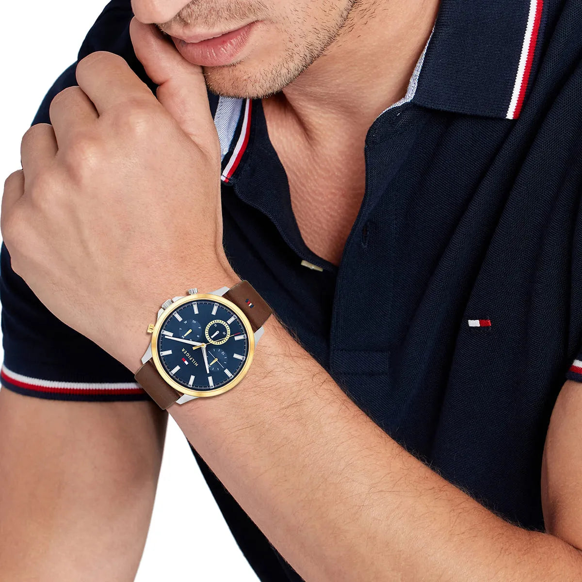 Tommy Hilfiger Ryder watch worn on wrist, full arm view with blue dial