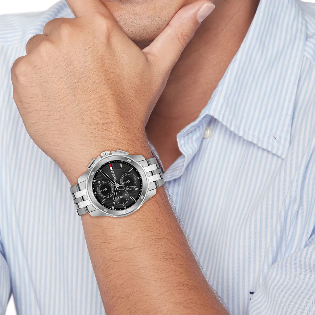 Tommy Hilfiger Walker watch on wrist showing black dial and chronograph subdials