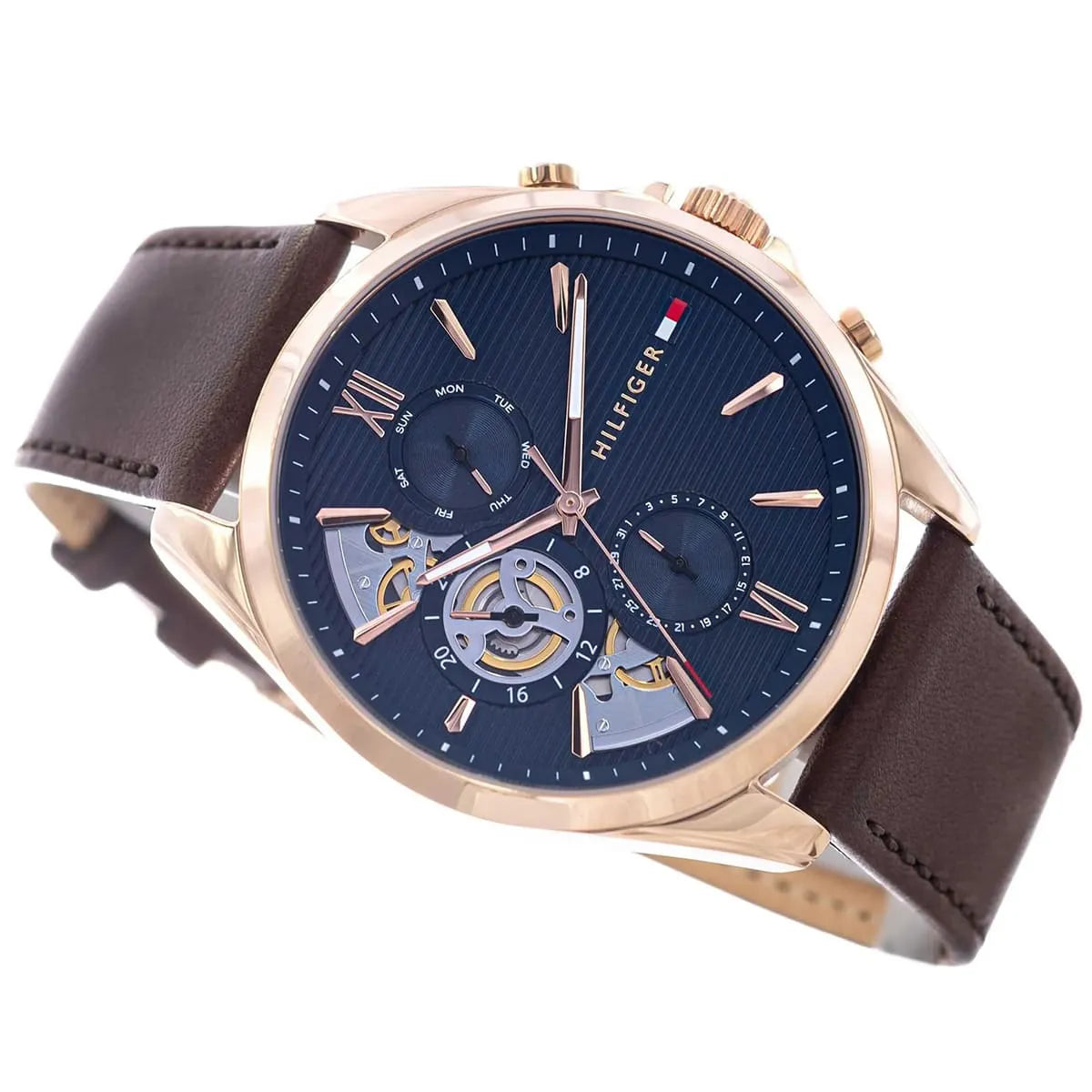 Three-quarter view of Tommy Hilfiger Baker watch with visible chronograph subdials and movement