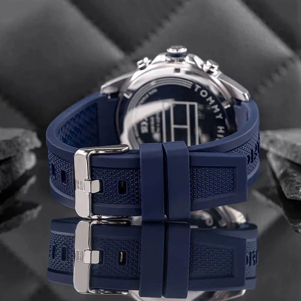 Navy rubber strap detail of Tommy Hilfiger Lars watch with metal buckle