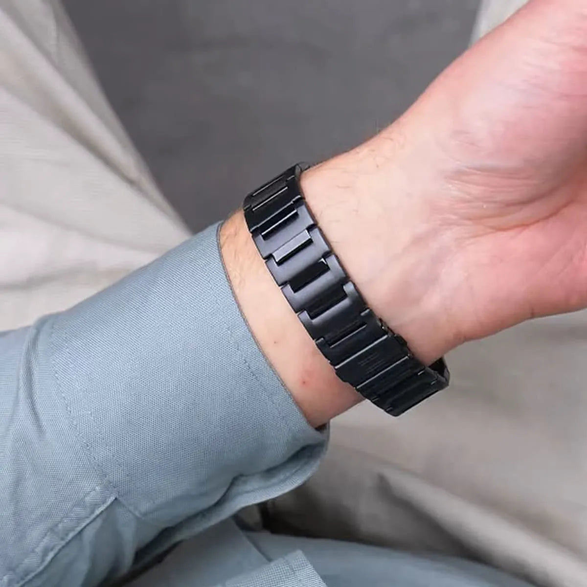 Tommy Hilfiger black chronograph watch on wrist showing profile and case design