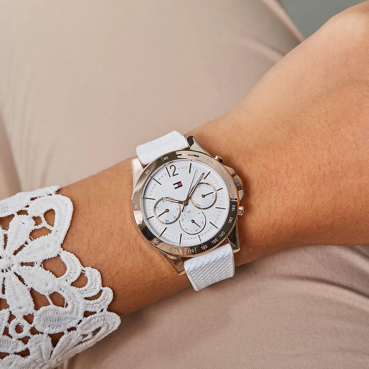 Tommy Hilfiger Haven women's watch worn on wrist with white silicone strap