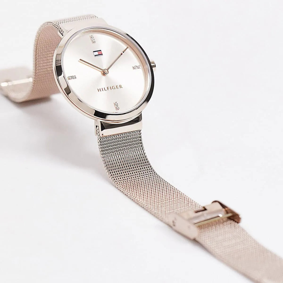 Tommy Hilfiger rose gold women's watch with mesh strap flat lay
