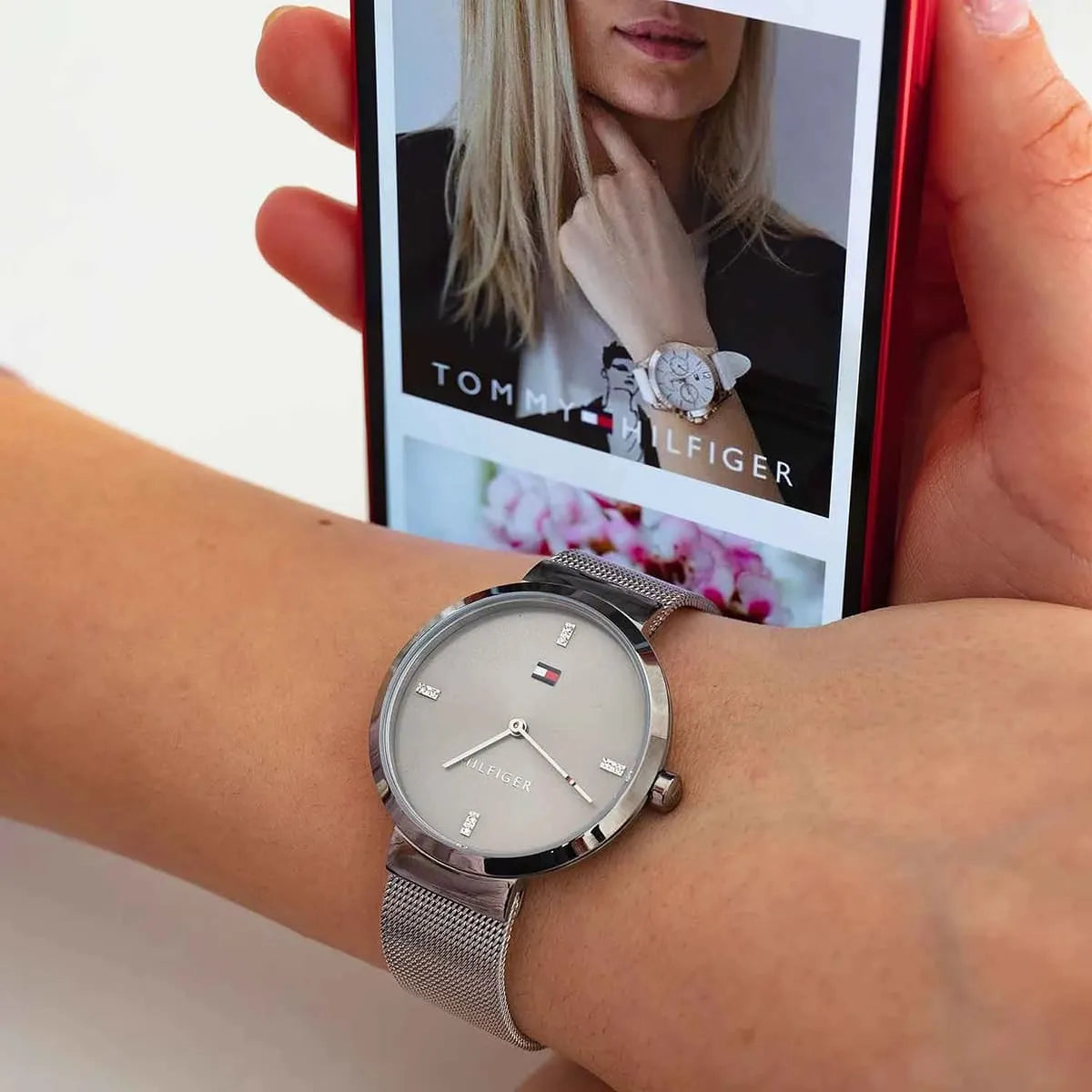 Tommy Hilfiger Liberty grey dial watch worn on wrist with silver mesh strap