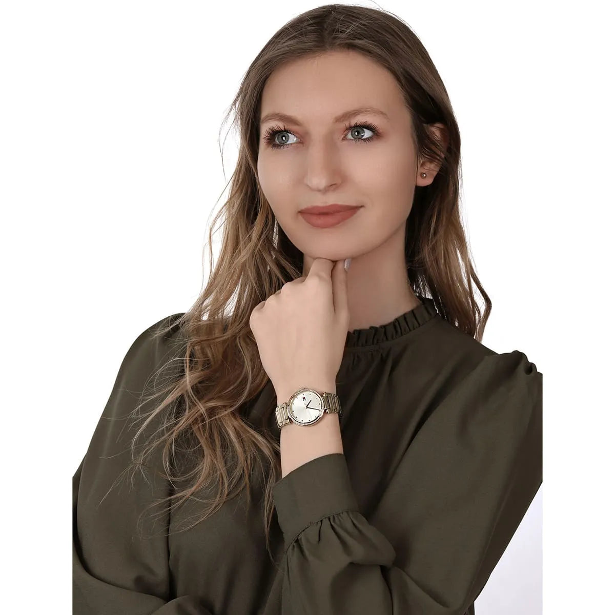 Model wearing Tommy Hilfiger Lynn gold watch with gold bracelet