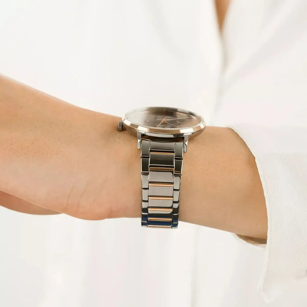 Tommy Hilfiger Jenna watch worn on wrist displaying full dial and bicolor band