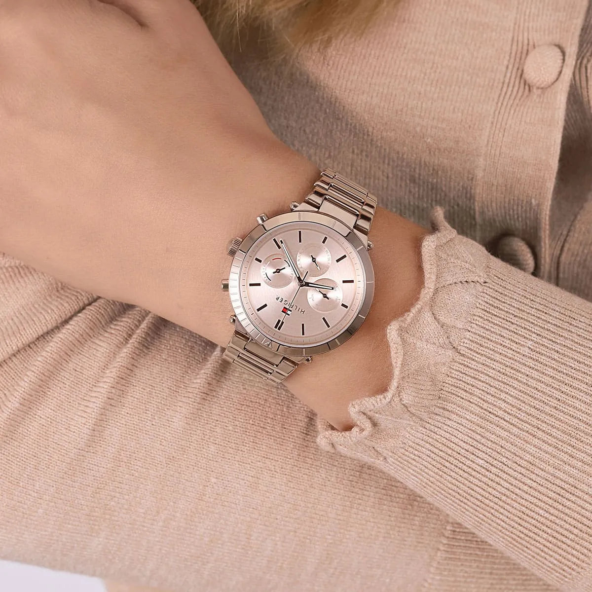 Tommy Hilfiger Libby rose gold women's watch worn casually on wrist