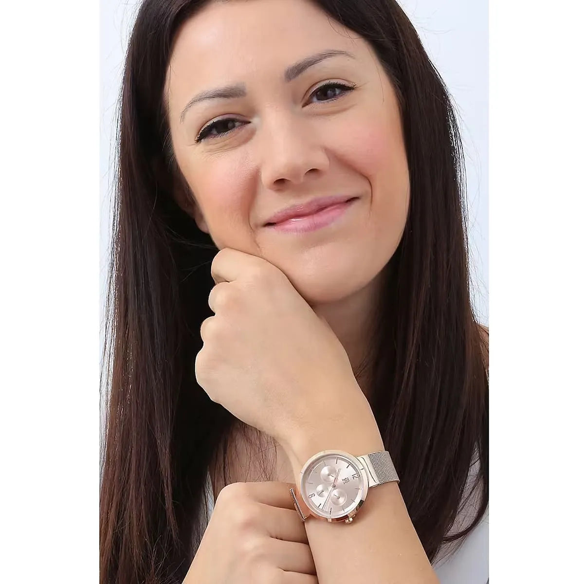 Woman wearing Tommy Hilfiger Lidia rose gold chronograph watch on wrist