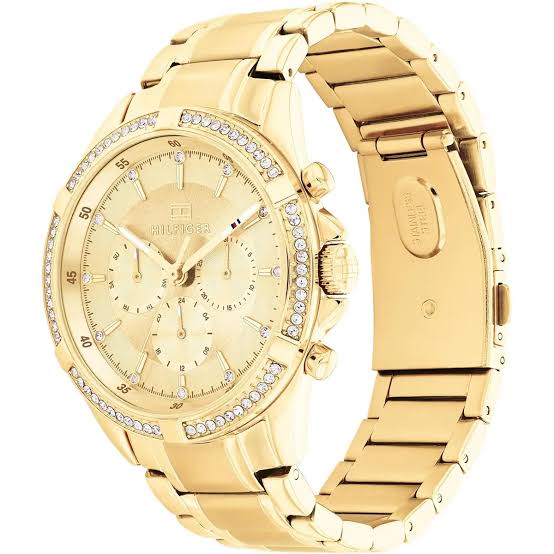 Side angle view of Tommy Hilfiger women's gold watch with stainless steel strap
