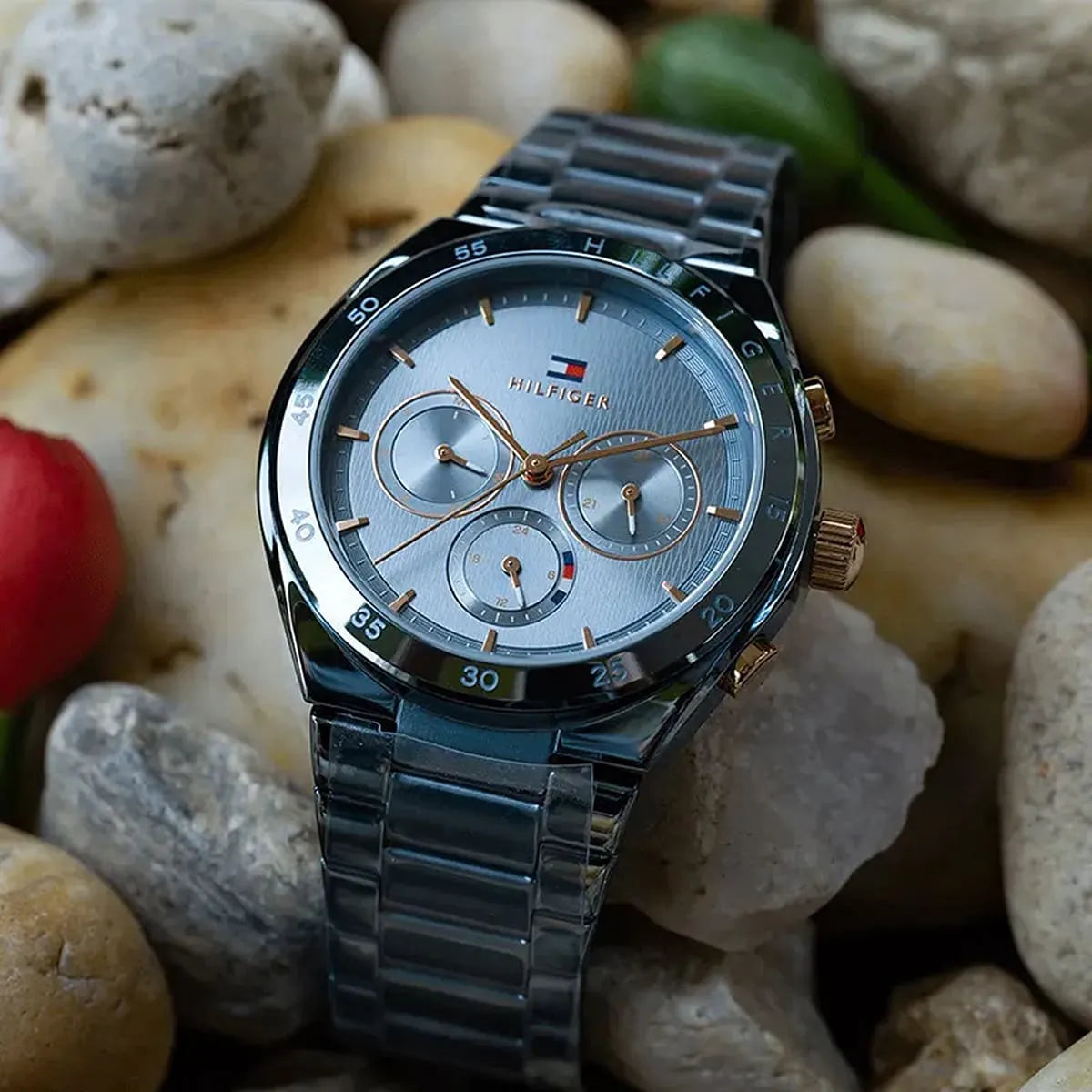 Tommy Hilfiger Carrie blue dial watch styled on natural background