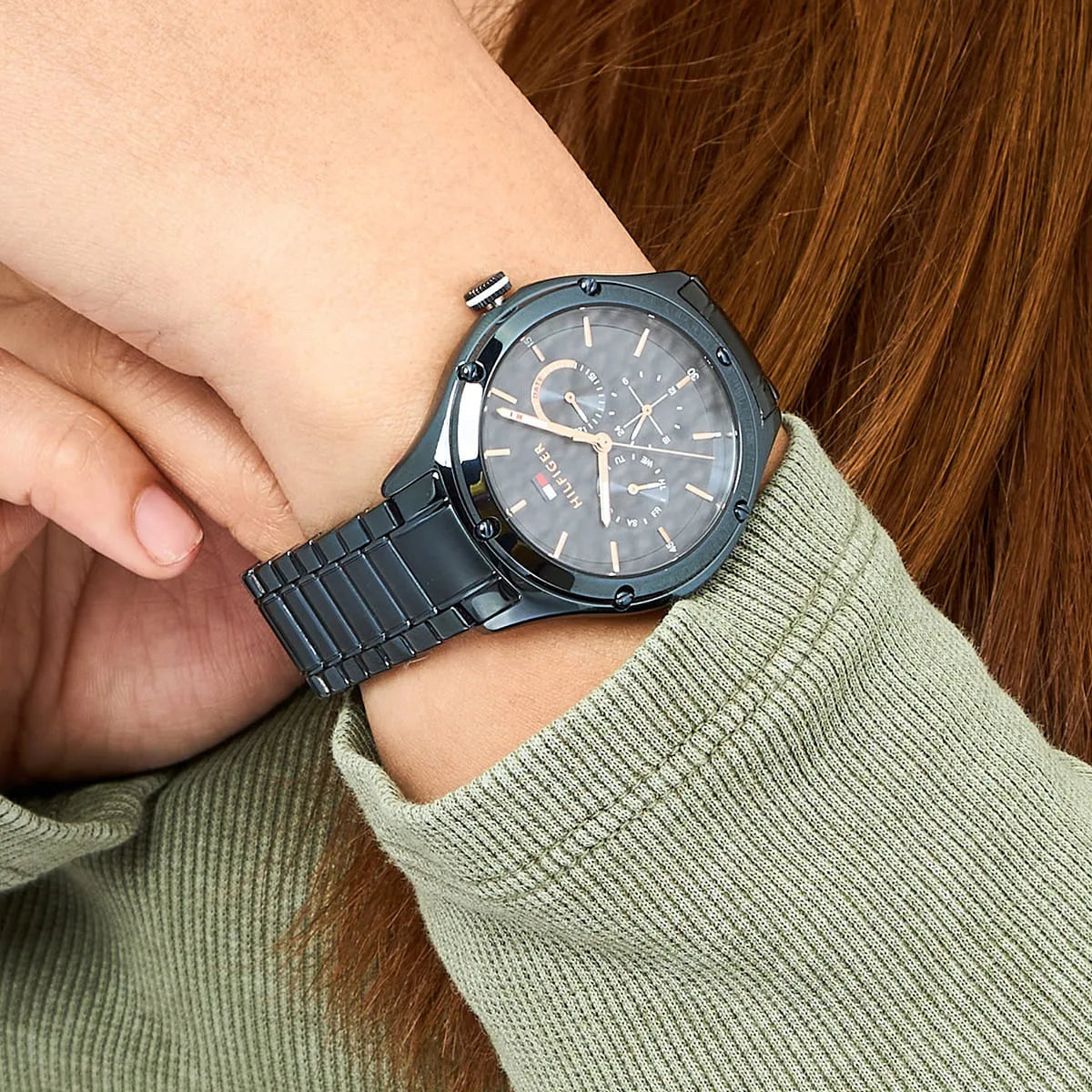 Tommy Hilfiger LEXI blue watch worn on wrist with metal bracelet
