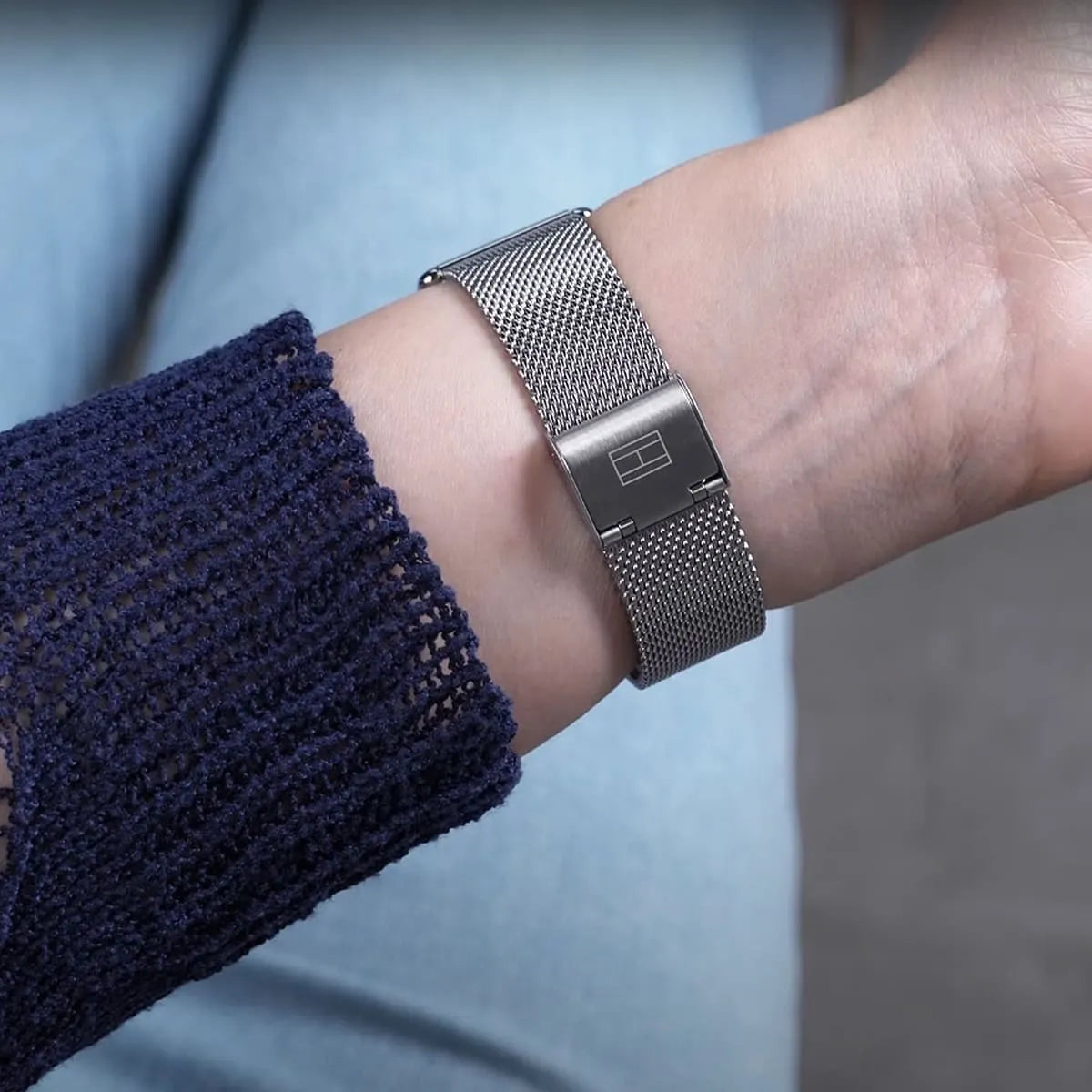 Close-up of silver mesh strap and fold-over clasp on Tommy Hilfiger Lily watch
