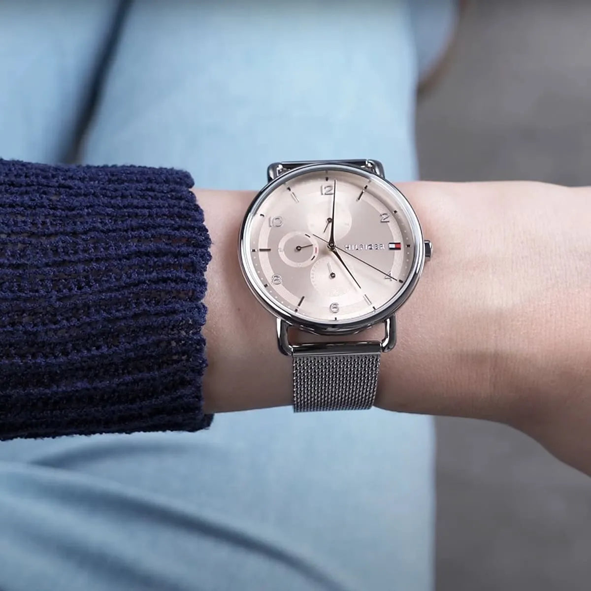 Tommy Hilfiger Lily watch worn on wrist with silver mesh band