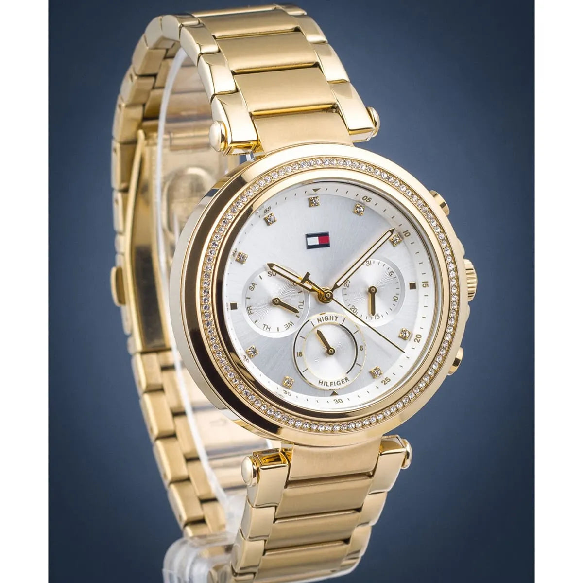 Tommy Hilfiger Emily women's watch side view showing gold stainless steel case and bracelet detail