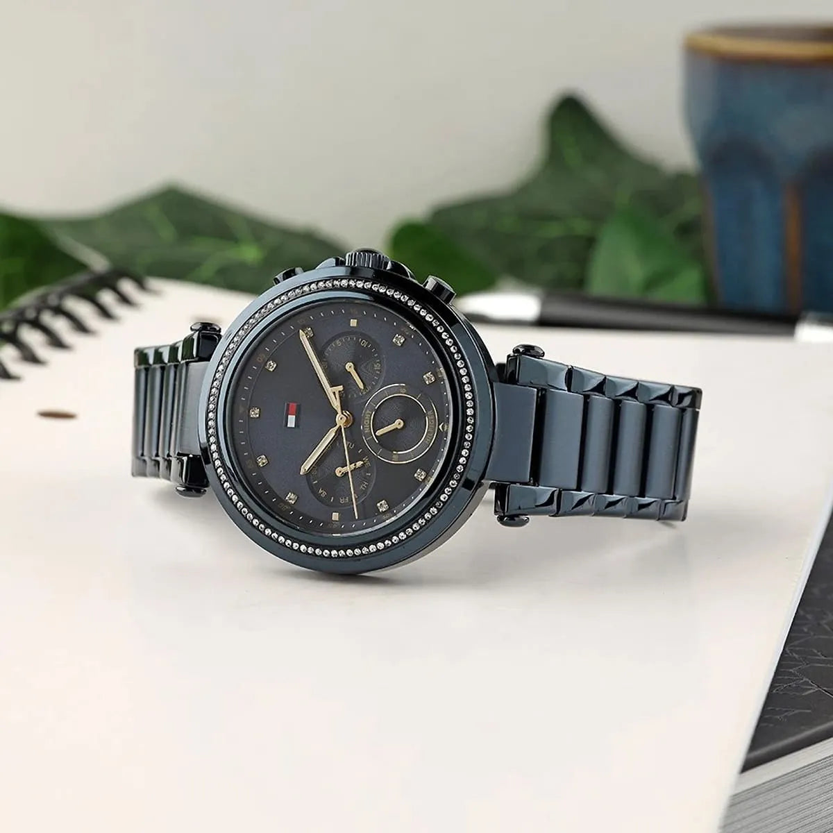 Tommy Hilfiger Emily chronograph watch with navy dial and navy metal strap displayed