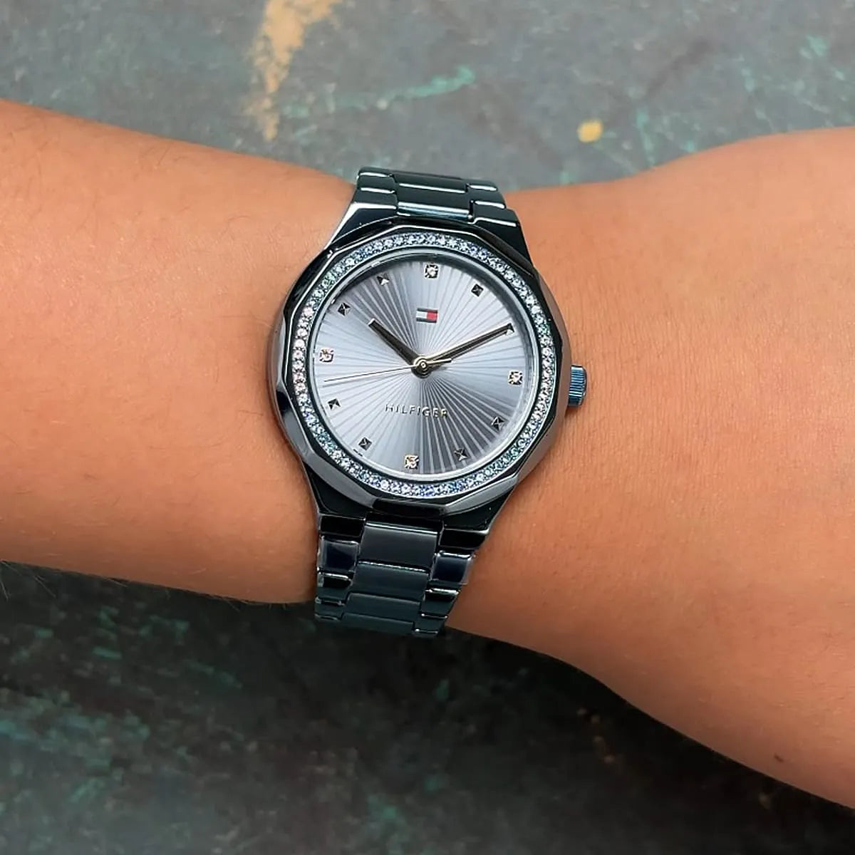 Tommy Hilfiger Piper ladies watch worn on wrist showing blue dial and crystal bezel