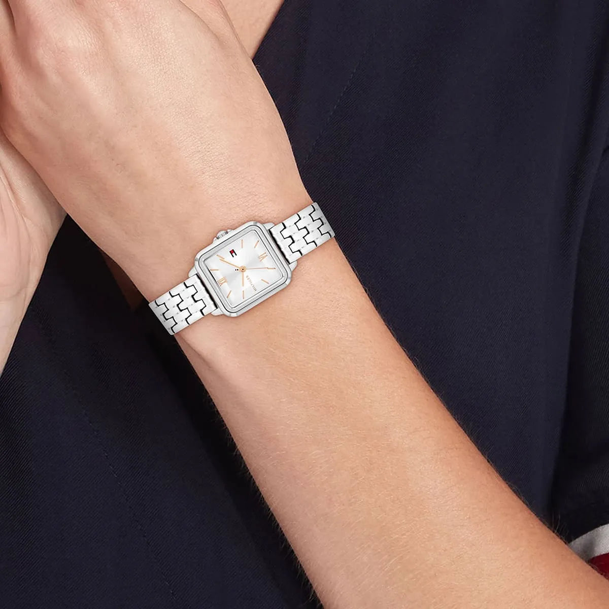 Tommy Hilfiger Mia watch worn on wrist with dark clothing