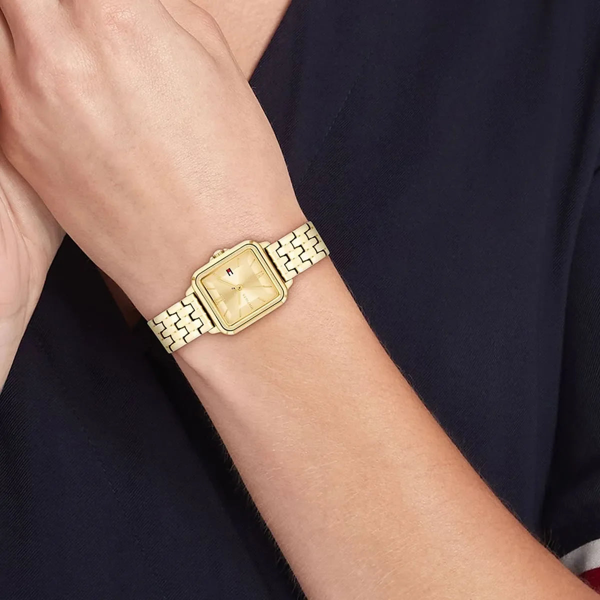 Tommy Hilfiger Mia gold watch on wrist showing dial and bracelet detail