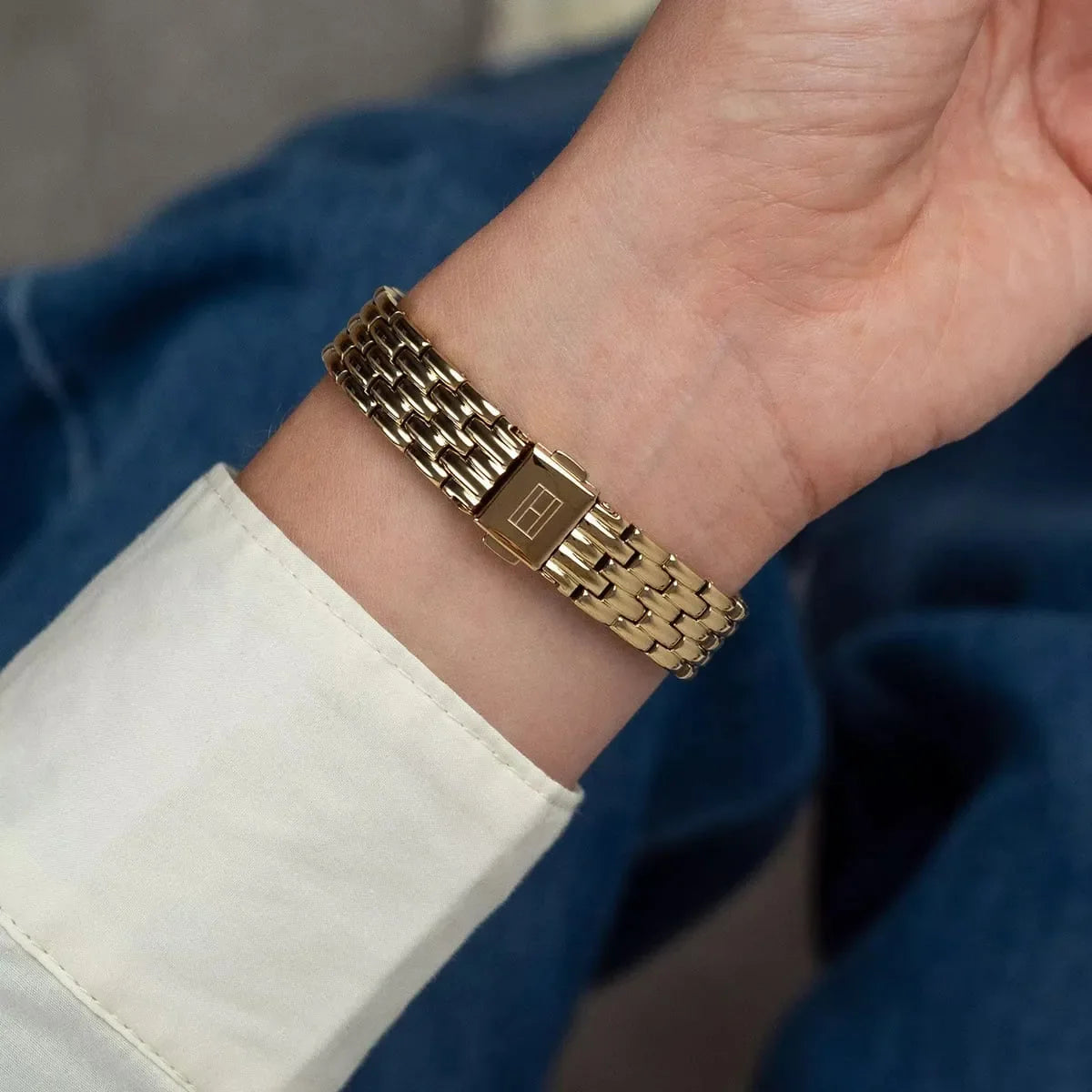 Close-up of Tommy Hilfiger Mia watch bracelet and clasp on wrist