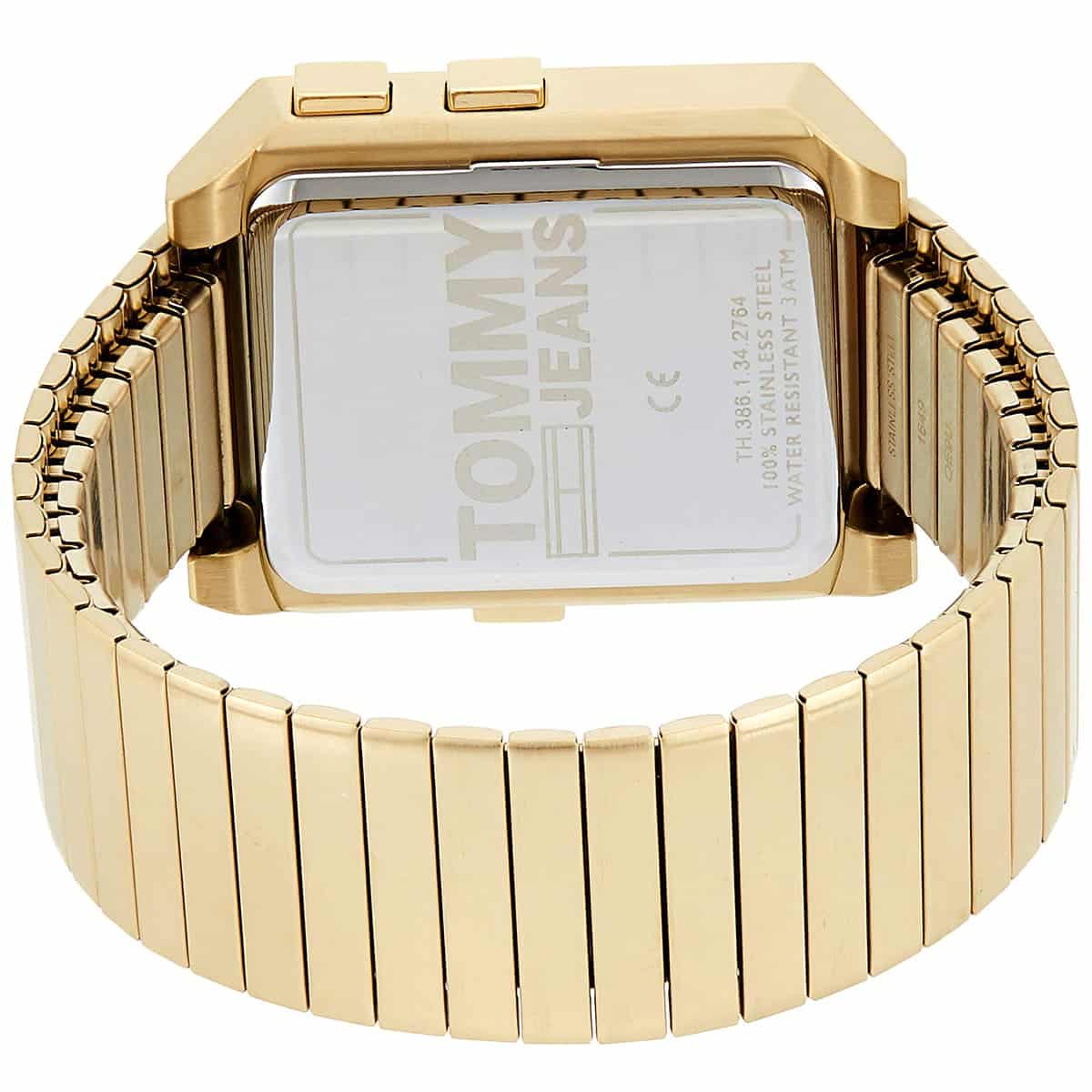 Caseback of Tommy Hilfiger gold watch displaying stainless steel case and branding