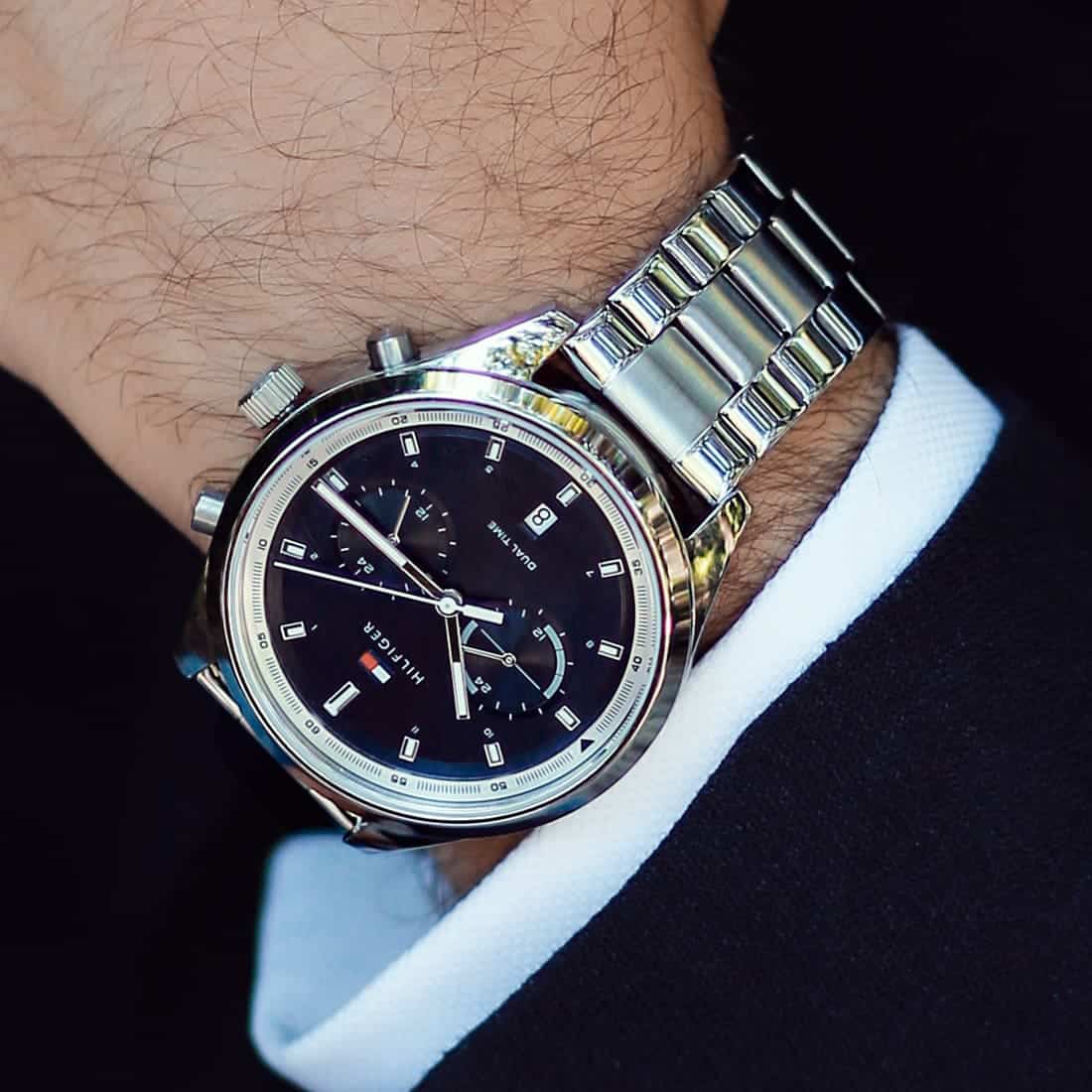 Tommy Hilfiger Bennett watch worn on wrist with stainless steel bracelet and blue dial, chronograph functions visible