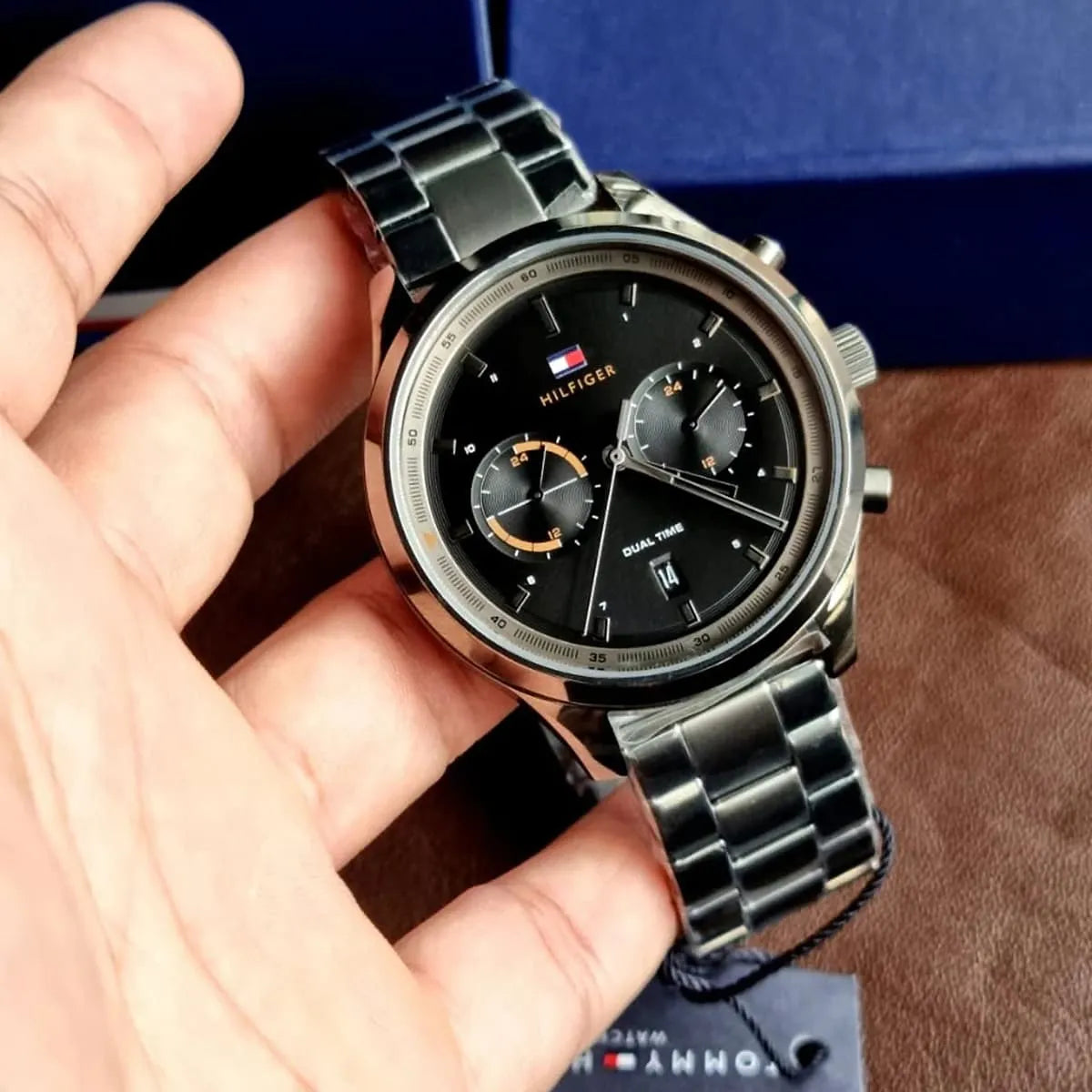 Tommy Hilfiger Bennett dual time chronograph watch in hand showing black dial with dual subdials