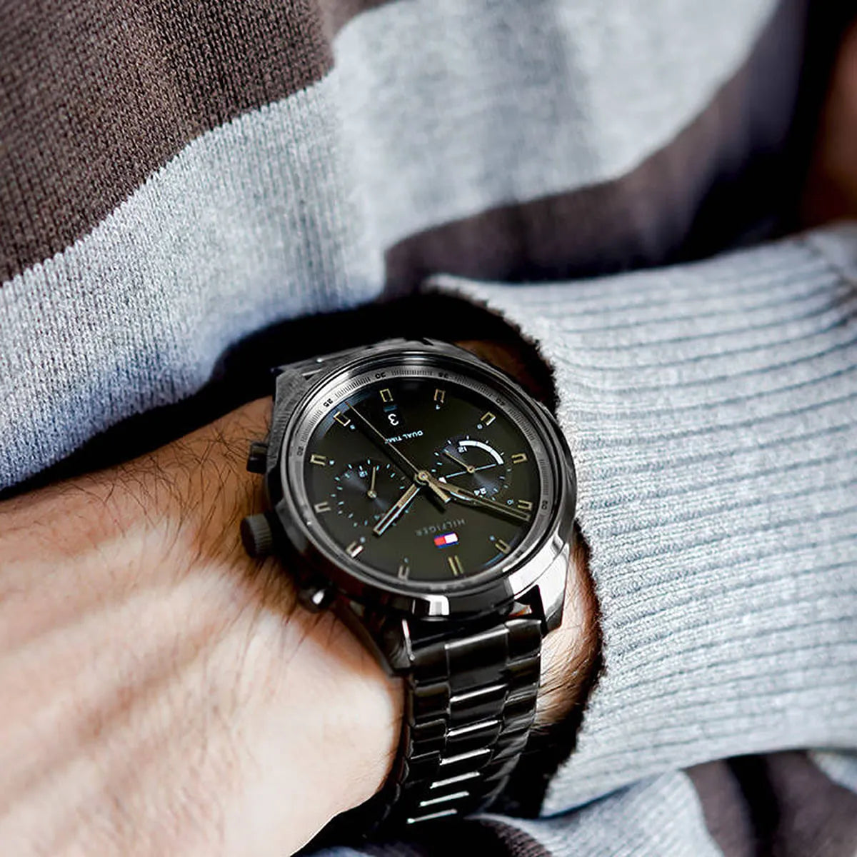 Tommy Hilfiger Bennett multifunction watch worn on wrist with black dial and chronograph visible