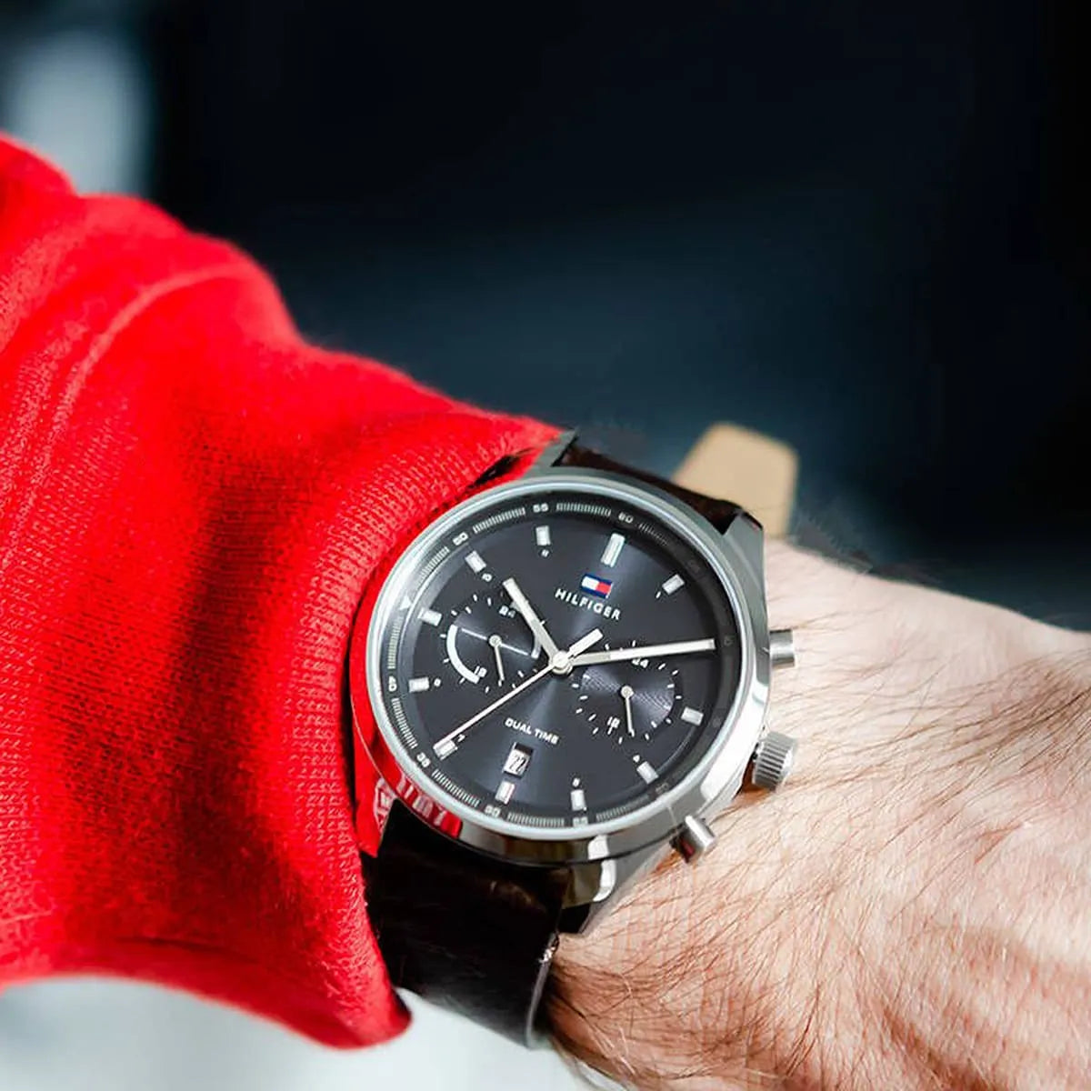 Tommy Hilfiger Bennett watch worn on wrist with black dial and brown leather strap