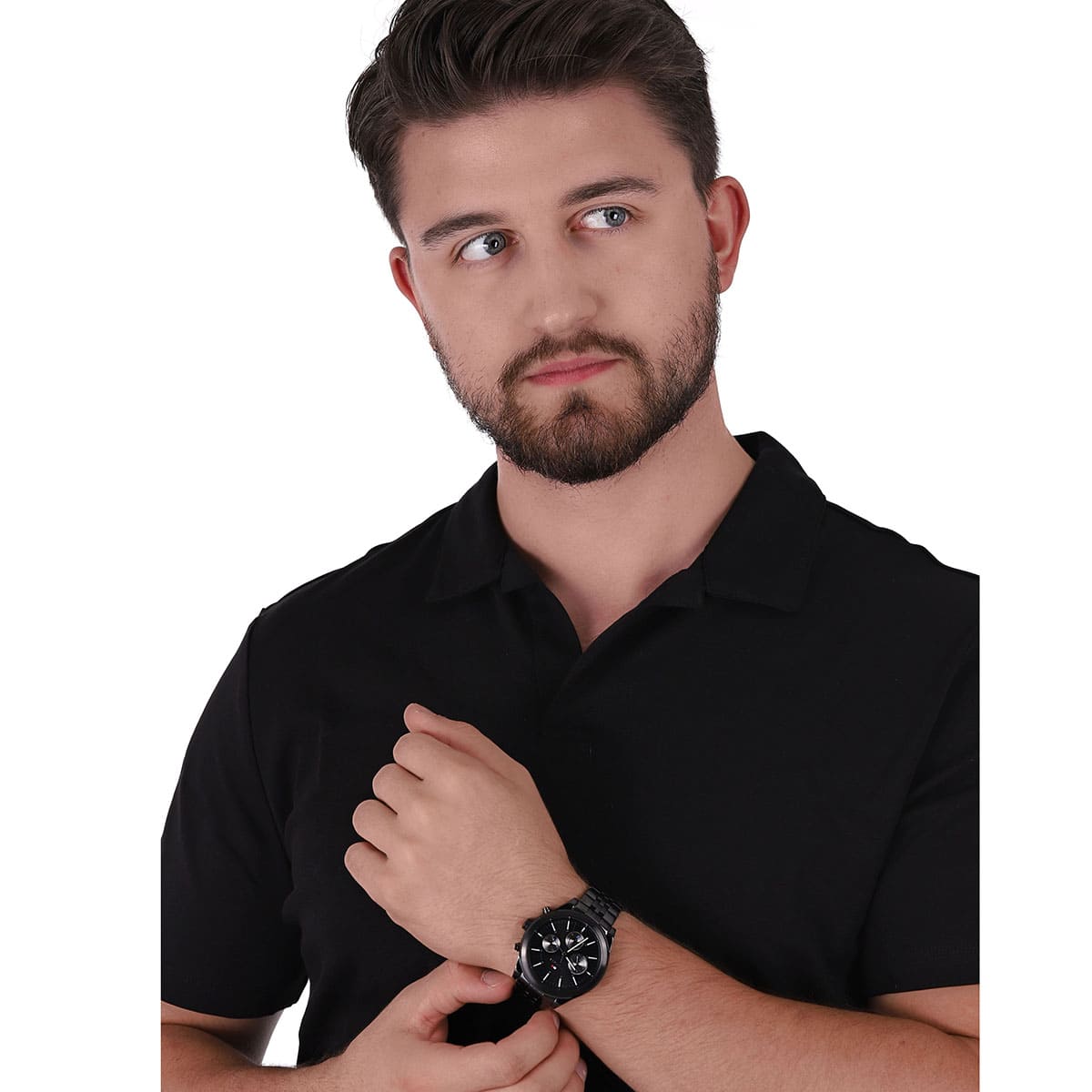 Man wearing Tommy Hilfiger Ashton black chronograph watch on wrist
