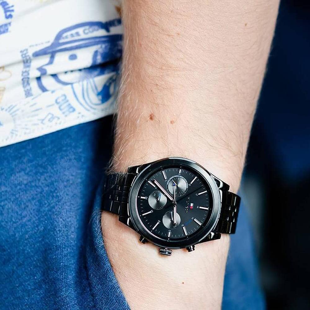 Tommy Hilfiger Ashton watch worn on wrist showing black dial and chronograph subdials