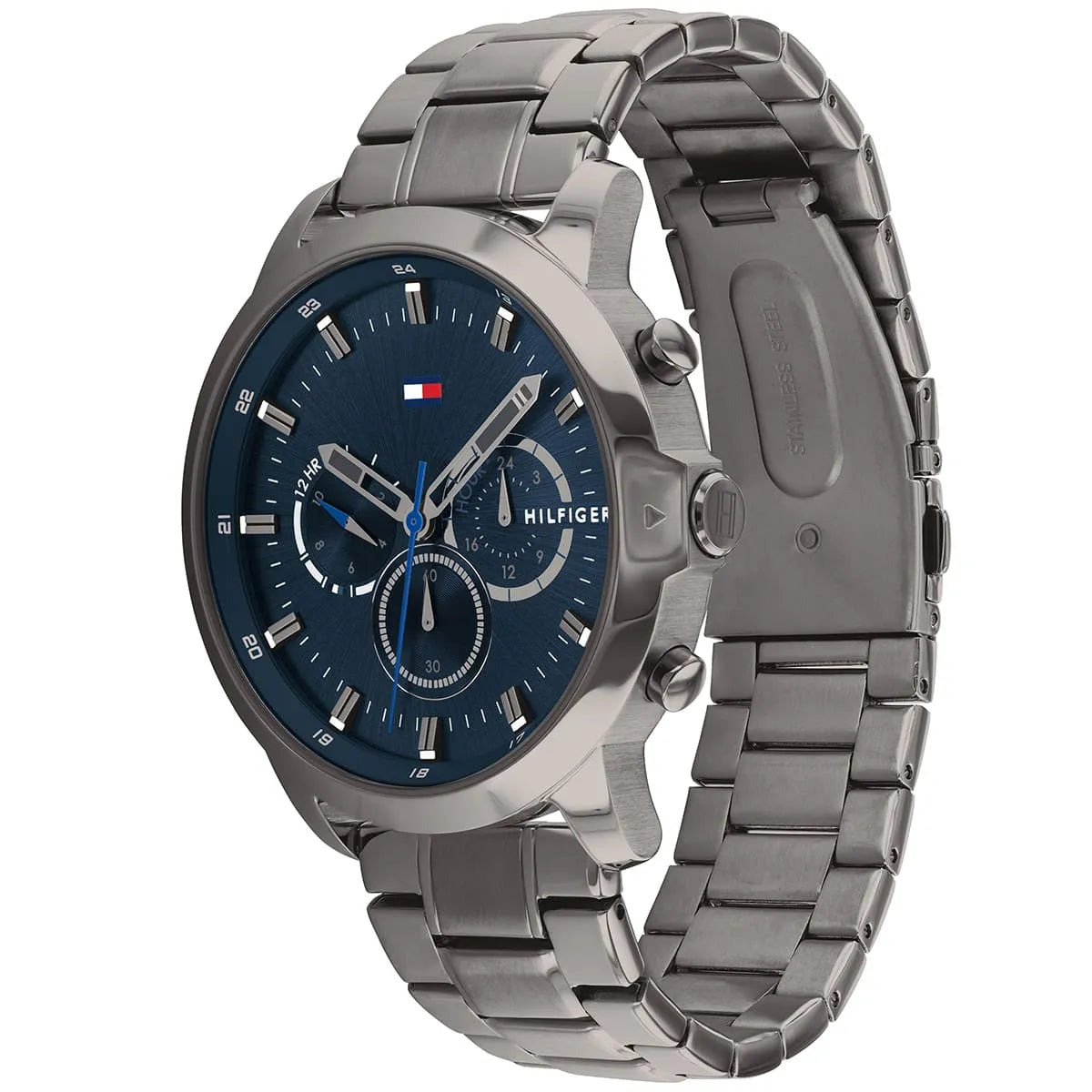 Angled view of Tommy Hilfiger watch showing blue dial and gray stainless steel bracelet