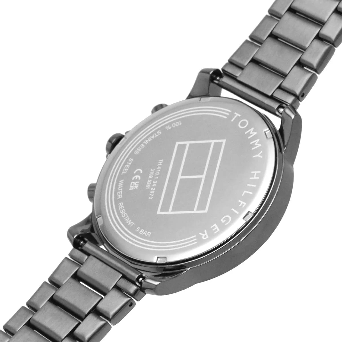Case back of Tommy Hilfiger watch showing stainless steel with branding and specifications