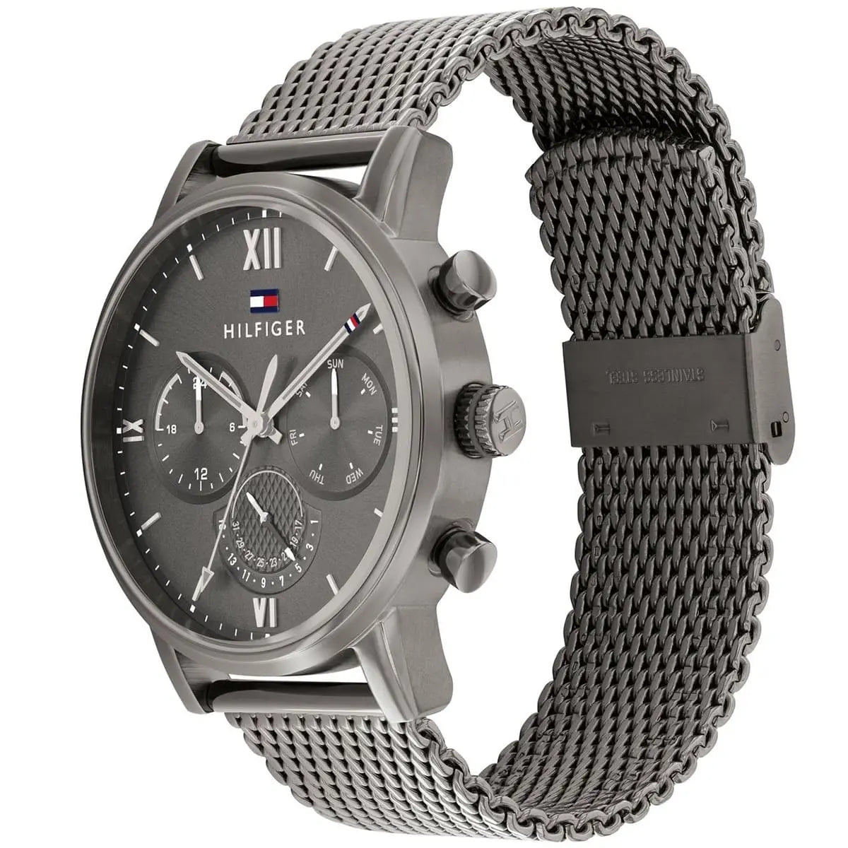 Side profile of Tommy Hilfiger watch showing stainless steel case and grey mesh strap
