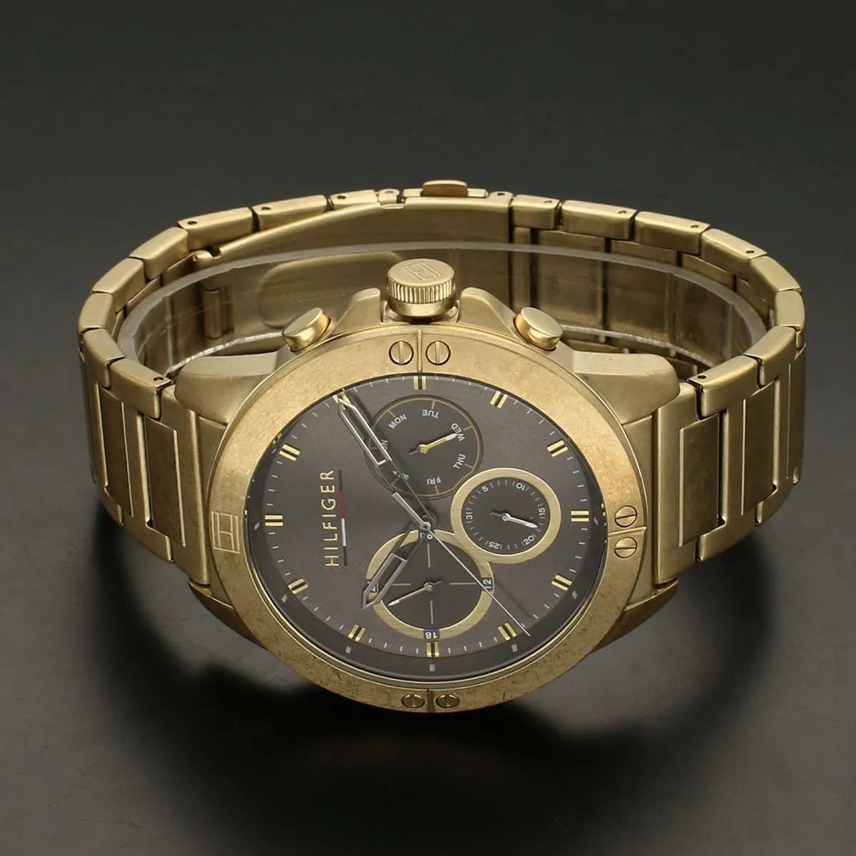 Tommy Hilfiger Mason chronograph watch detail showing grey dial and gold case